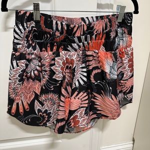 Black floral printed smocked waste running shorts size large
